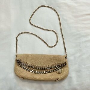 Henri Bendel beige, leather, clutch with metal and suede trim